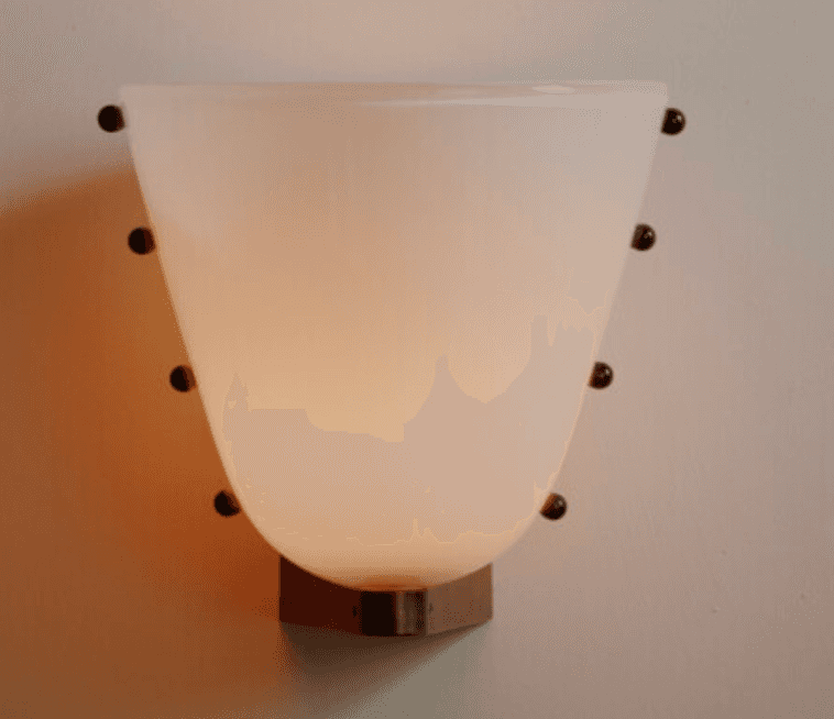 A wall-mounted lighting fixture, commonly known as a wall sconce, featuring an opaque white or frost… — 3D model