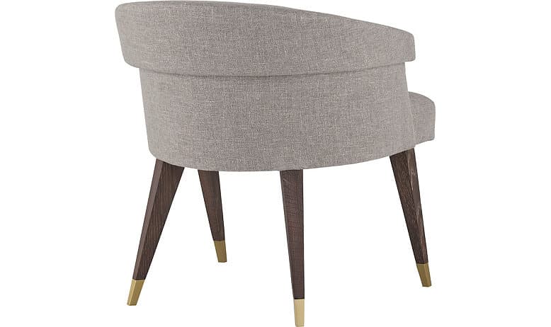An armchair with a curved backrest and a fabric upholstery. The chair has four tapered wooden legs with brass-colored ferrules at the base of each leg. — 3D model