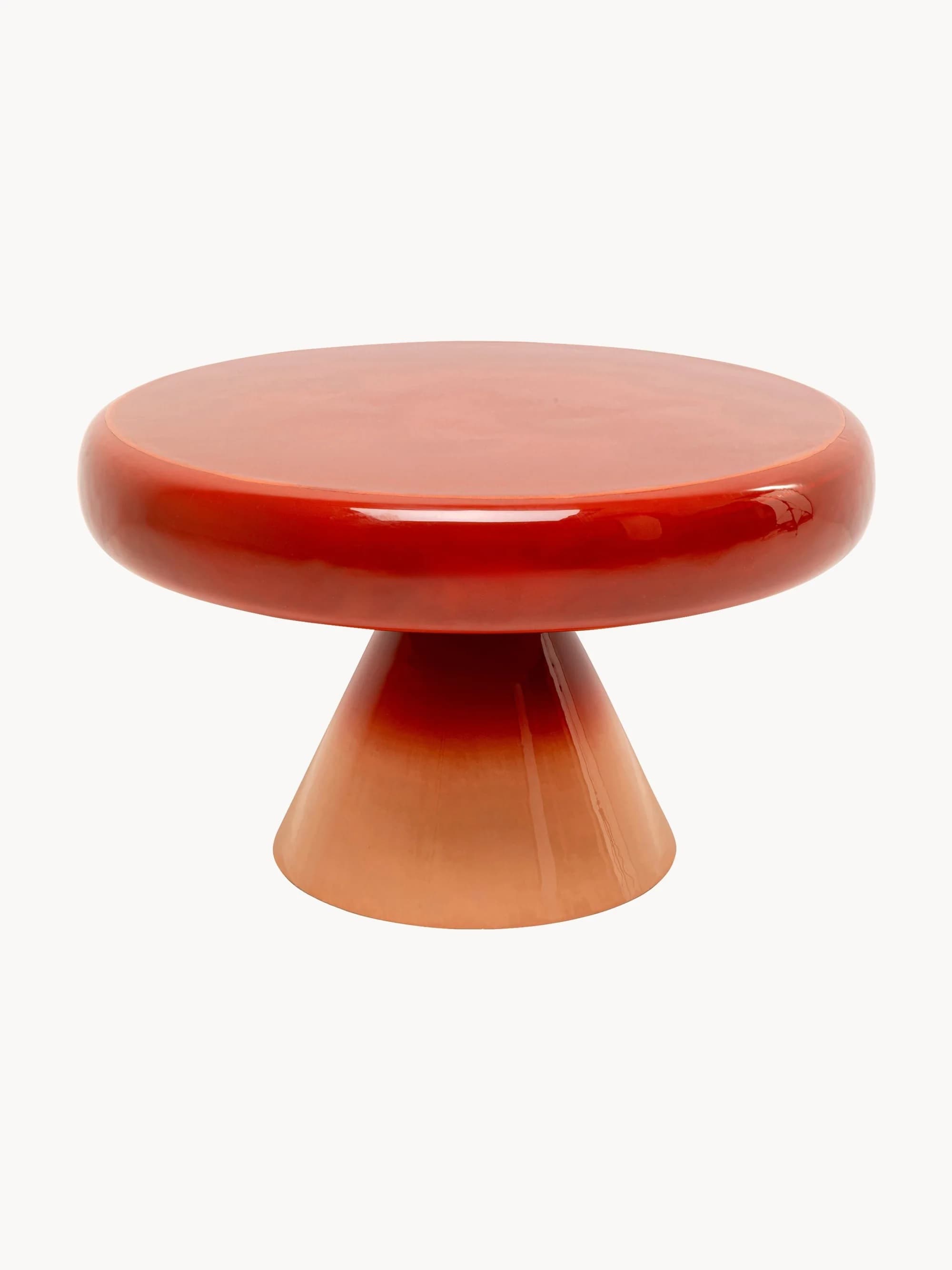 A contemporary low table featuring a round top and a conical pedestal base, both finished with a high-gloss, gradient lacquer in an ombre red-orange to peach color scheme. The design is minimalist and sculptural. — 3D model