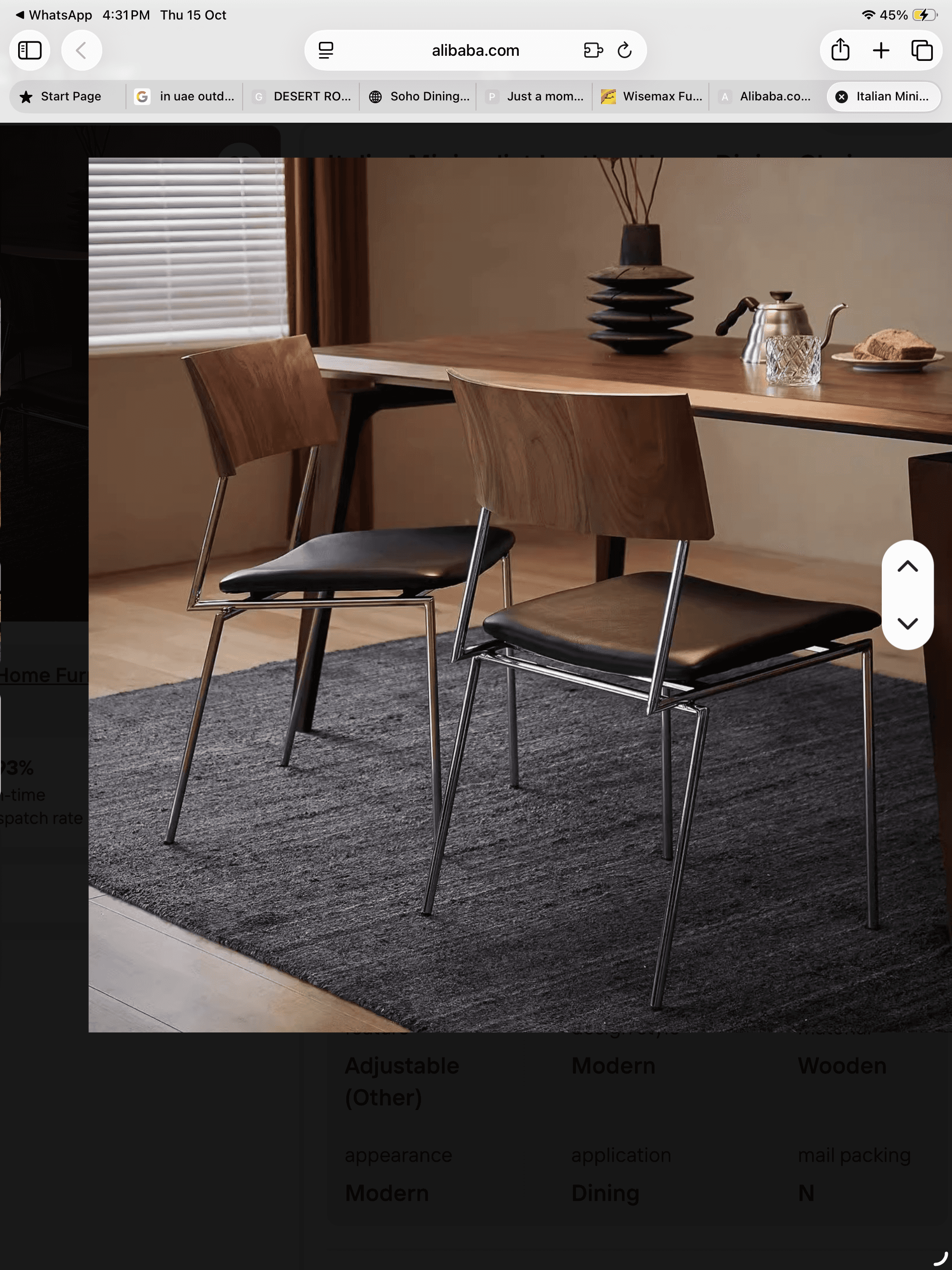 A contemporary dining chair featuring an armless design. It has a curved, dark wood (likely walnut p… — 3D model