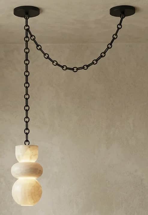 A contemporary pendant light featuring a sculptural shade crafted from translucent alabaster, suspen… — 3D model