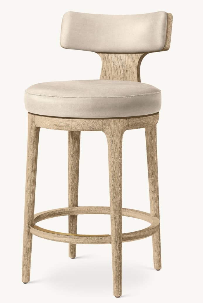 A contemporary bar stool with a light-colored wood frame and a cushioned seat and backrest. The stool features a circular seat and a curved backrest with a notched silhouette. The wooden base consists of four legs connected by a circular footrest. — 3D model