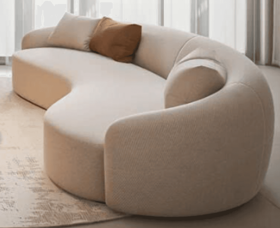 An S-shaped, curvilinear sofa upholstered in a light beige fabric, featuring soft, rounded edges and… — 3D model