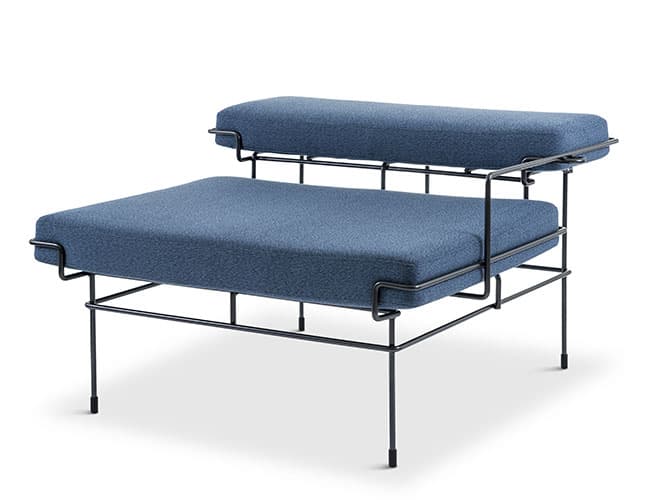 A modern lounge chair featuring a minimalist black wire frame supporting separate blue upholstered seat and back cushions. The design is open and airy, with a floating backrest. — 3D model