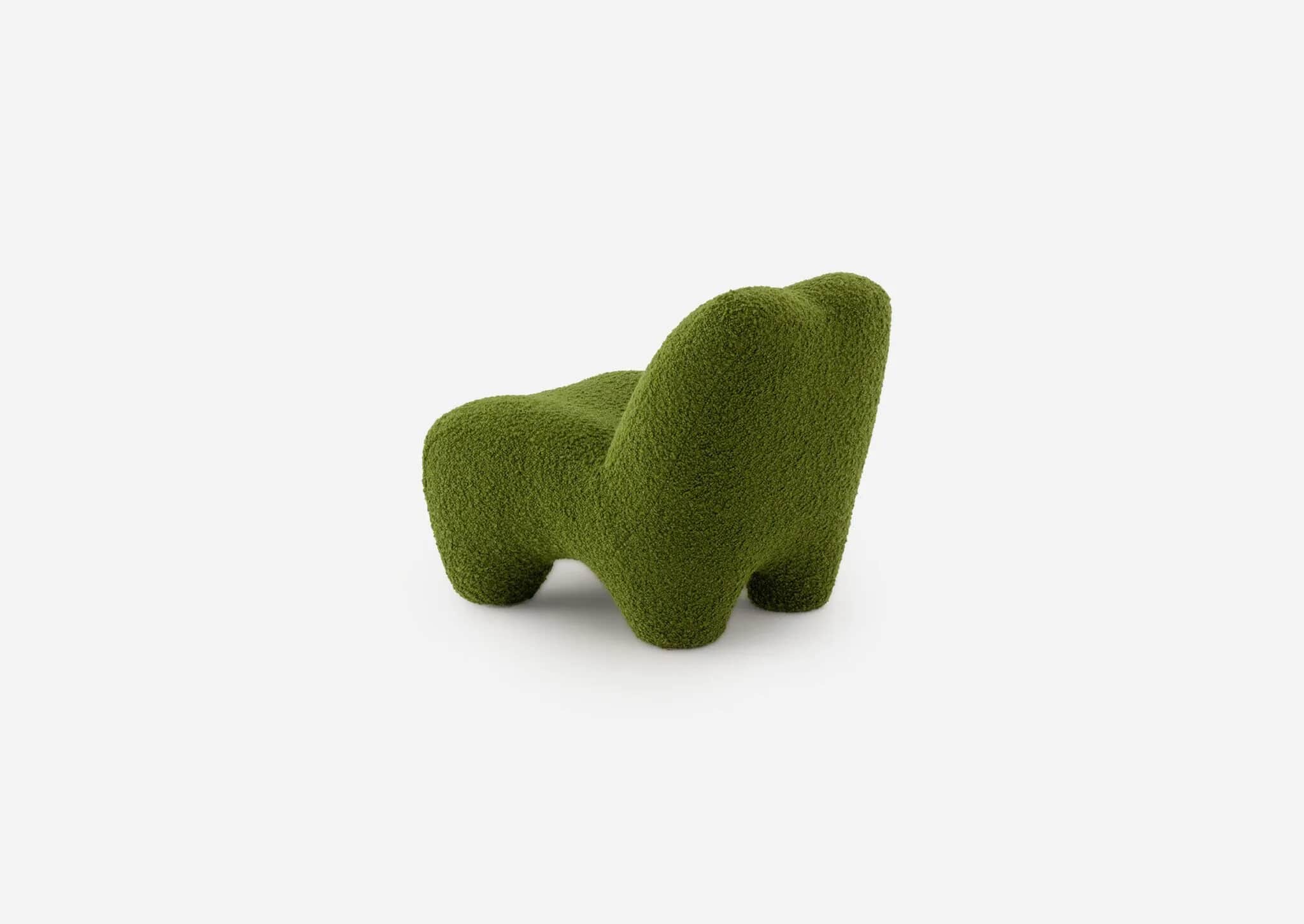 A low-slung, green, organic shaped lounge chair, entirely upholstered in a textured boucle fabric wi… — 3D model