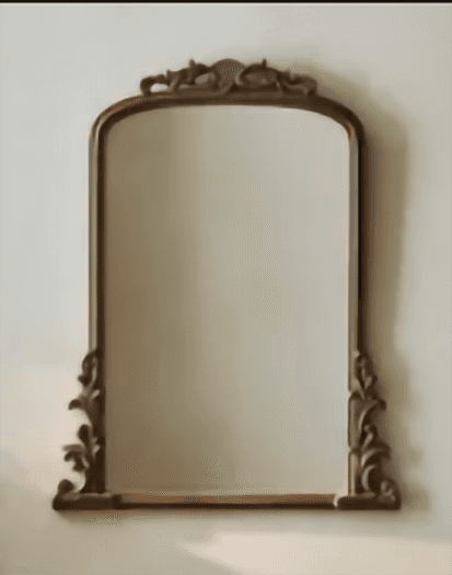 A freestanding cheval mirror featuring an arched top and an elaborately carved dark brown wooden fra… — 3D model