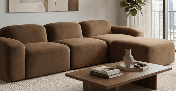 A contemporary modular sectional sofa upholstered in a brown fabric, featuring multiple individual s… — 3D model