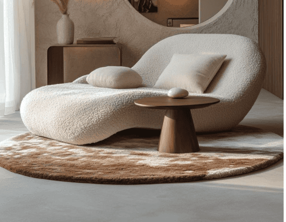 An organically shaped chaise lounge upholstered in a textured bouclé fabric, featuring a flowing, co… — 3D model