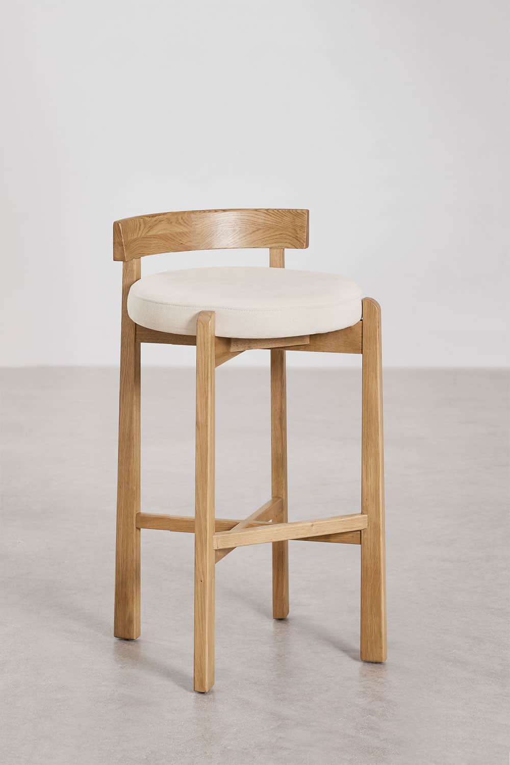 A contemporary bar stool featuring a light-toned wooden frame, a circular upholstered seat in a ligh… — free SKP 3D model