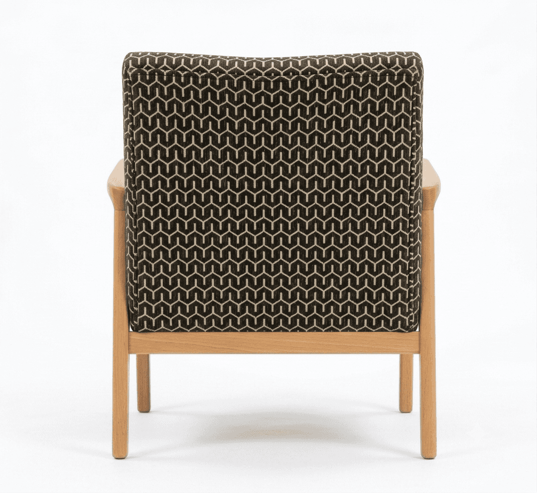 An armchair featuring a light wood frame with exposed armrests and legs, and a backrest upholstered… — free OBJ 3D model