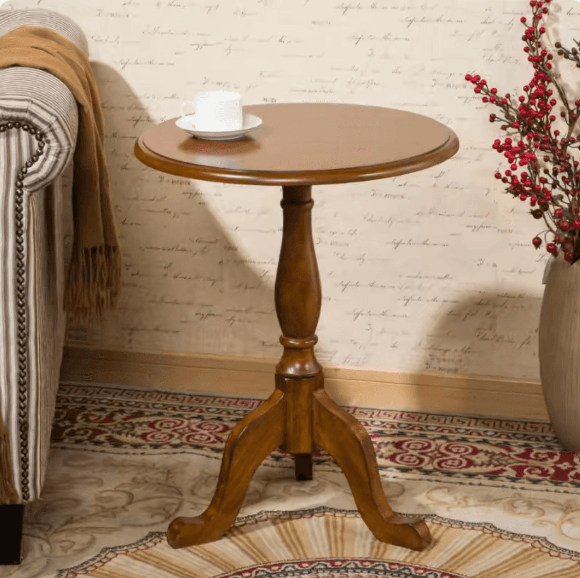 A small, round wooden table featuring a turned pedestal base and three curved, splayed legs. The tab… — 3D model