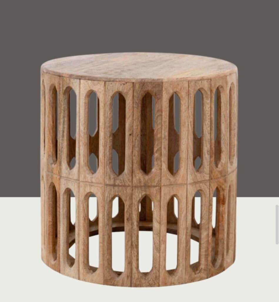 A round wooden table with a solid top and a cylindrical base featuring two tiers of carved, elongate… — 3D model