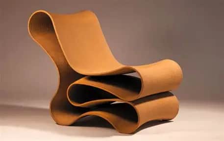 A highly sculptural lounge chair characterized by its continuous, ribbon-like form, creating an inte… — free OBJ 3D model