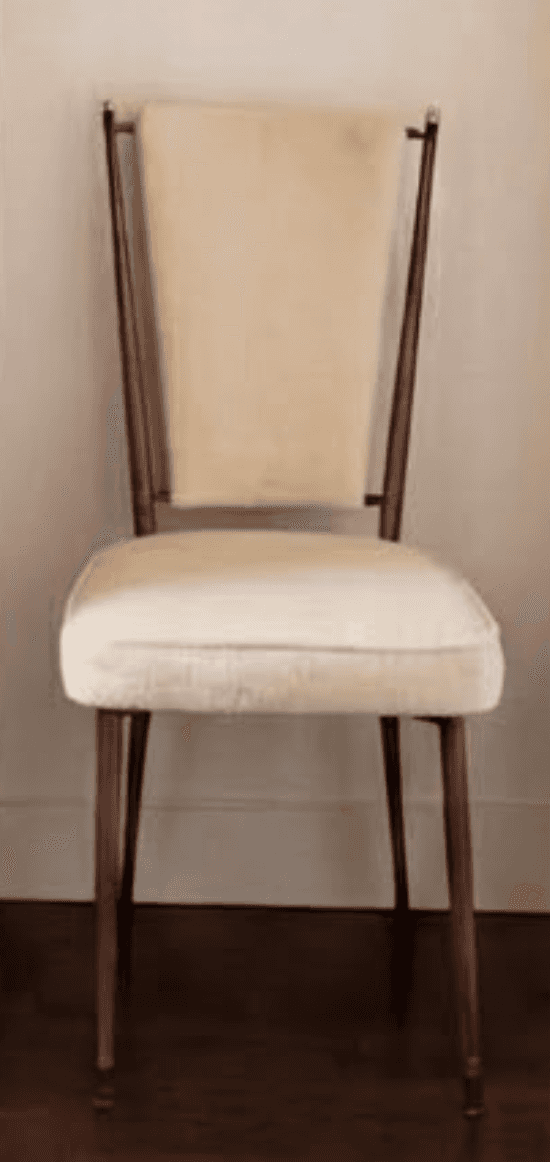 A dining chair with a wooden frame and upholstered seat and back. The frame is made of dark wood wit… — 3D model