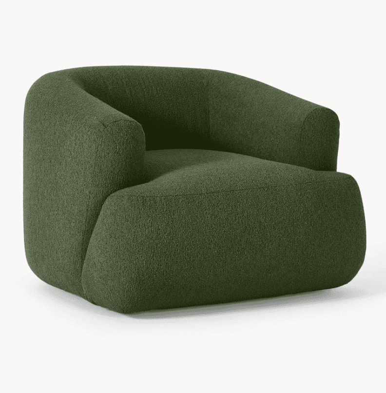 A contemporary armchair with a rounded, sculptural design. It features a deep seat, integrated armre… — 3D model