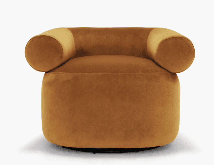 A contemporary lounge chair upholstered in a rich ochre velvet fabric, featuring a rounded, continuo… — 3D model
