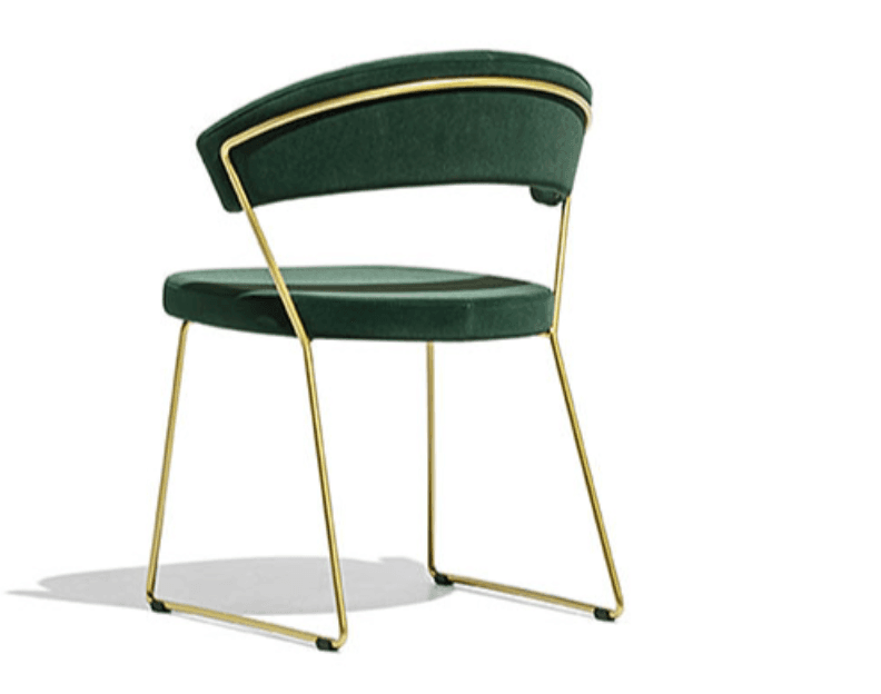 A side chair with a curved backrest and a cushioned seat. The chair features a thin, metallic gold frame that supports the seating and backrest. The upholstery appears to be a plush velvet fabric in a deep green color. The base consists of four slender legs, two extending from the seat and two from the backrest support, forming a minimalist structure. — 3D model