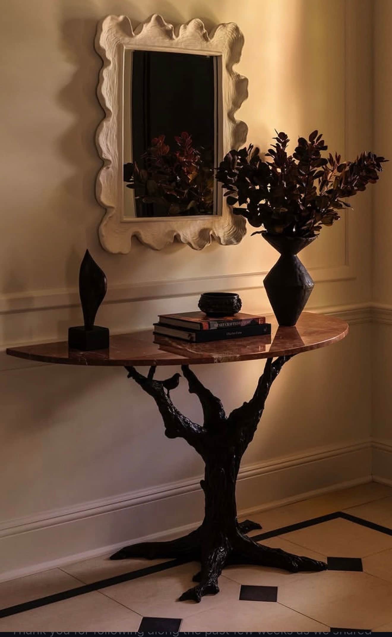 A sophisticated demilune (half-round) console table featuring a polished pink marble top with natura… — 3D model