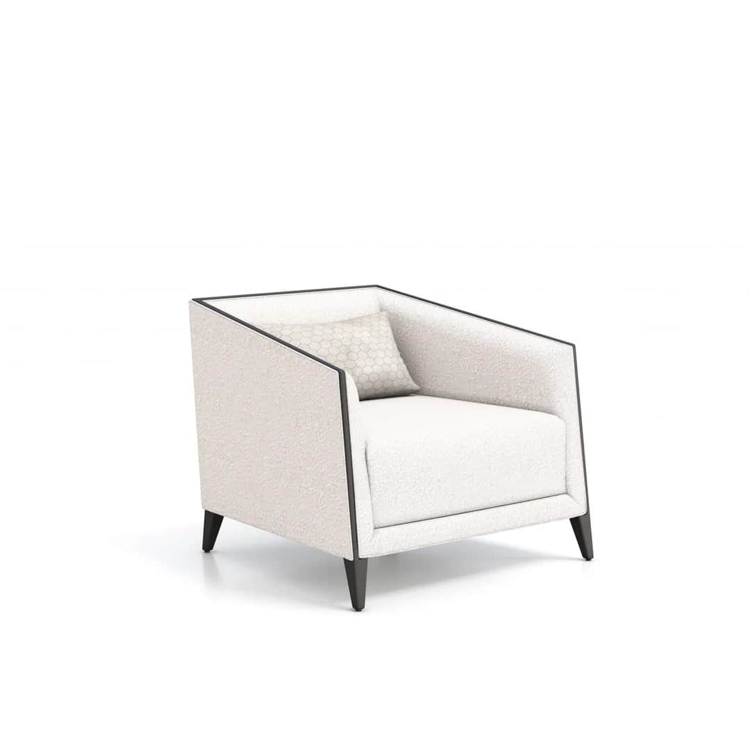 A contemporary armchair with a slightly reclined back and wide armrests. The upholstery has a textur… — free OBJ 3D model