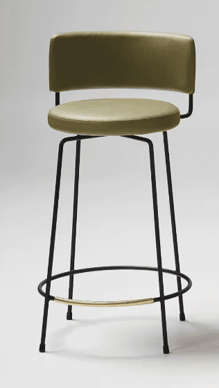 A contemporary bar stool with a mid-century modern aesthetic, featuring an olive green upholstered seat and backrest, supported by a slender black metal frame with a brass footrest accent. — 3D model