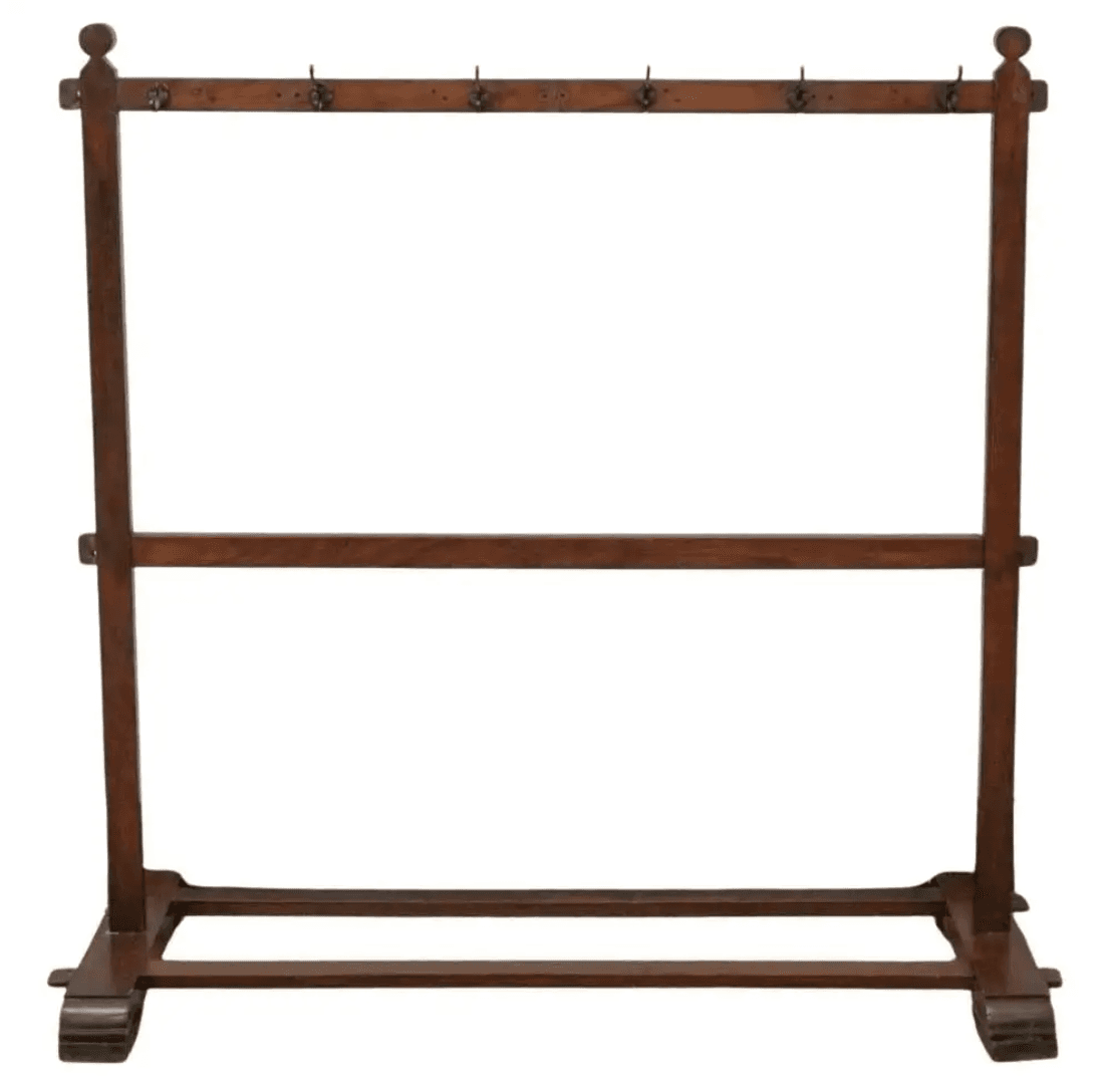 A dark-stained wooden freestanding coat rack featuring two vertical posts topped with decorative finials, connected by two horizontal rails. The upper rail is equipped with six metal hooks for hanging garments or accessories. The lower rail adds structural stability, and the piece rests on a robust base with splayed, scrolled feet. — 3D model