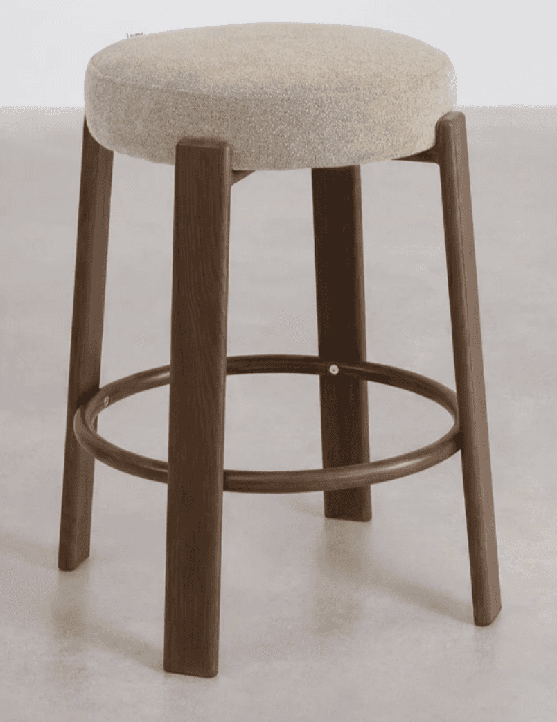 A wooden stool with a padded, round seat. The stool has four legs and a circular stretcher connectin… — 3D model