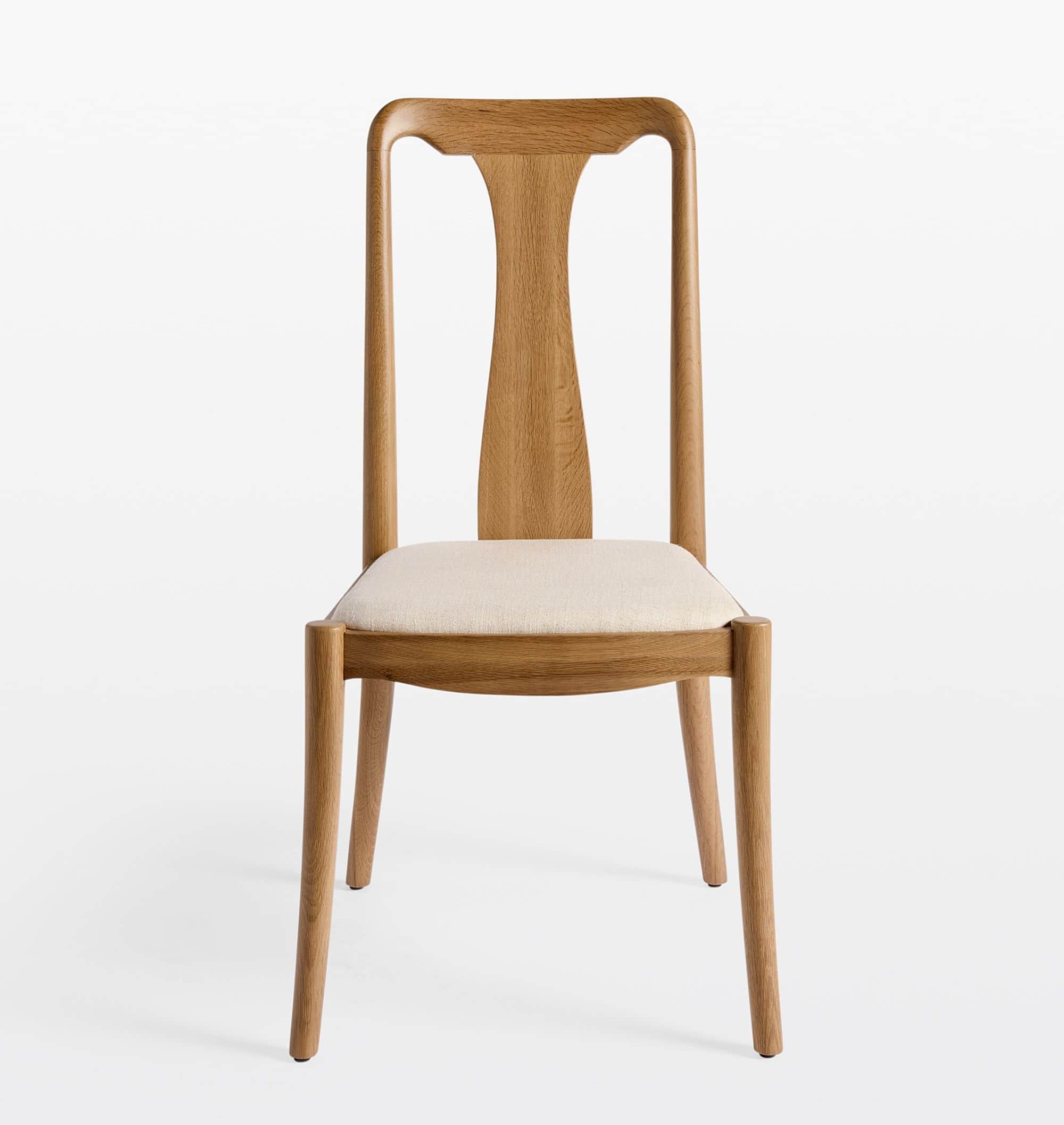 A modern dining chair constructed from light-toned oak wood with a distinctive T-shaped backrest and… — 3D model