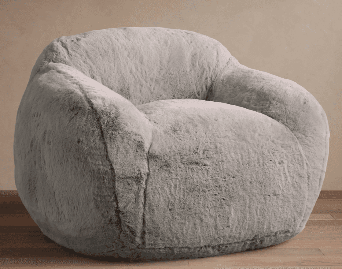 A plush, light gray faux fur lounge chair with a rounded and inviting silhouette. The chair features… — 3D model