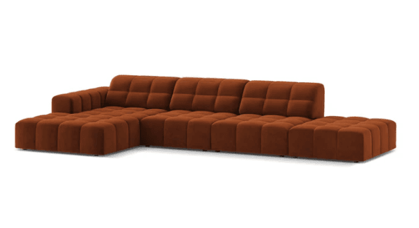 An L-shaped modular sectional sofa featuring deep, square tufting across all seating and back cushions, upholstered in a rich burnt orange velvet-like fabric. The sofa includes an integrated chaise lounge on one end, and its low-profile design emphasizes comfort and modern aesthetics. — 3D model