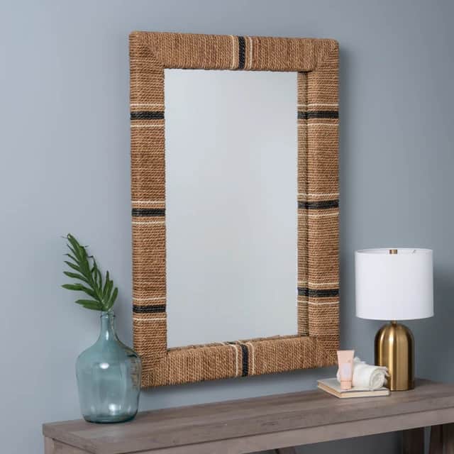 A rectangular mirror with a thick frame wrapped in natural fiber rope. The rope has alternating band… — 3D model