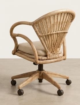 A desk chair constructed with a natural woven rattan frame for the backrest and armrests. The seat is upholstered with a light-colored fabric cushion. The chair features a five-star base with casters for mobility, and a central column for height adjustment. The design incorporates a curved backrest and arm supports. — 3D model