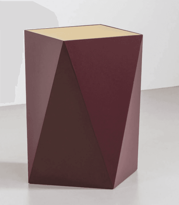 A geometric side table with a faceted, angular design. The main body is a deep plum or burgundy colo… — 3D model