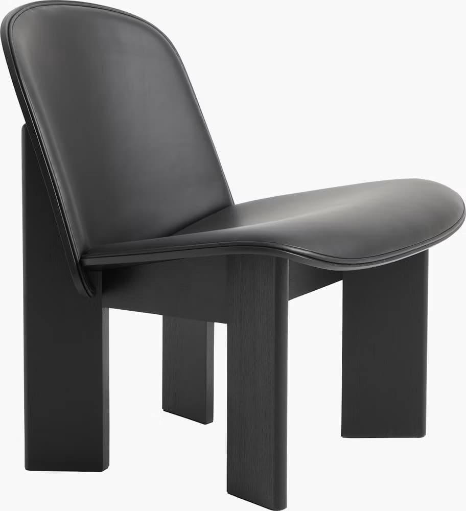 A modern, low-slung armless lounge chair featuring a black upholstered seat and backrest, supported by a solid black wooden frame. The seat and backrest have a gentle, ergonomic curve, and the chair lacks traditional arms, giving it a minimalist and sleek aesthetic. — 3D model