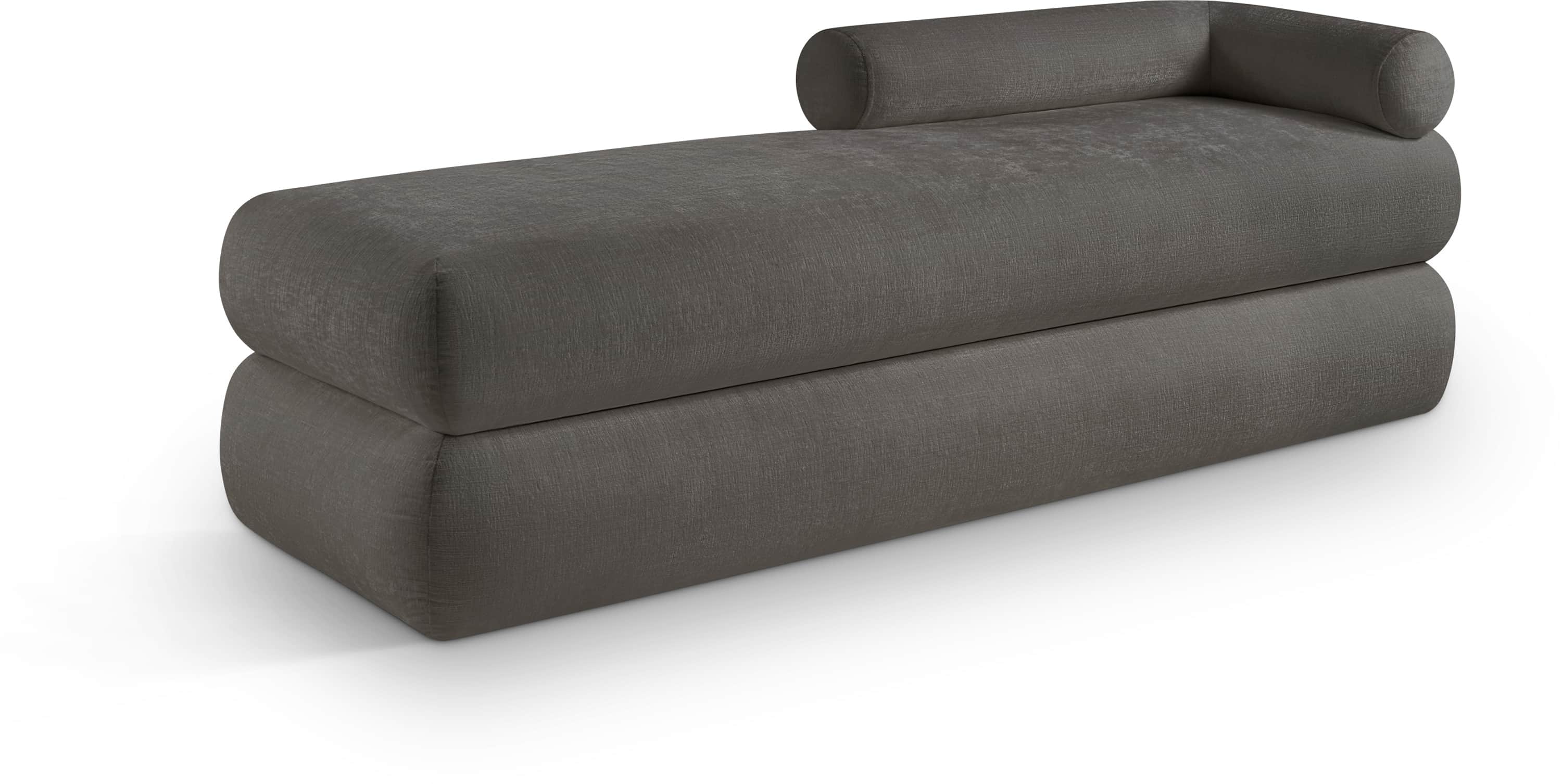 A contemporary chaise lounge featuring a rectangular, block-like base and an integrated top cushion,… — 3D model