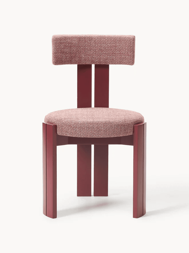 A contemporary dining chair with a distinct geometric design. The chair features a rectangular, upholstered seat and a similarly shaped, upholstered backrest supported by a central, upright wooden frame. The legs and the frame are constructed from wood and are painted a deep red color. The upholstery is a textured fabric in a muted pink and red woven pattern. The design is minimalist and modern. — 3D model