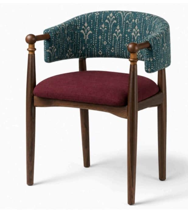 A stylish barrel back armchair featuring a dark stained wooden frame with tapered legs and turned ar… — free STL 3D model