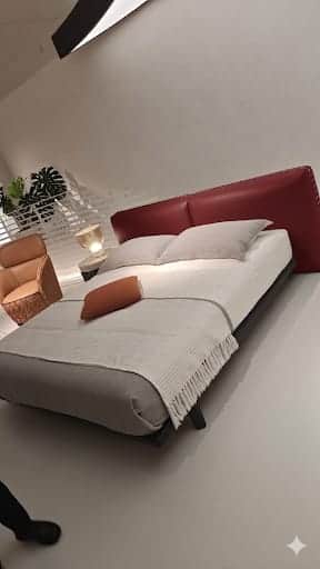 A modern bed frame with a low profile and a tall, segmented headboard. The frame appears to be made… — free OBJ 3D model