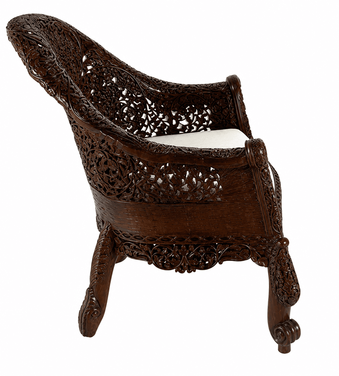 An ornately hand-carved dark wood armchair featuring intricate floral and foliate motifs across its entire frame. The chair has a high, curved backrest and substantial arms, all rendered in deeply carved patterns. It is fitted with a light-colored, possibly cream or off-white, upholstered cushion for the seat. The legs are also carved, ending in scroll-like feet. The overall aesthetic is elaborate and traditional. — 3D model