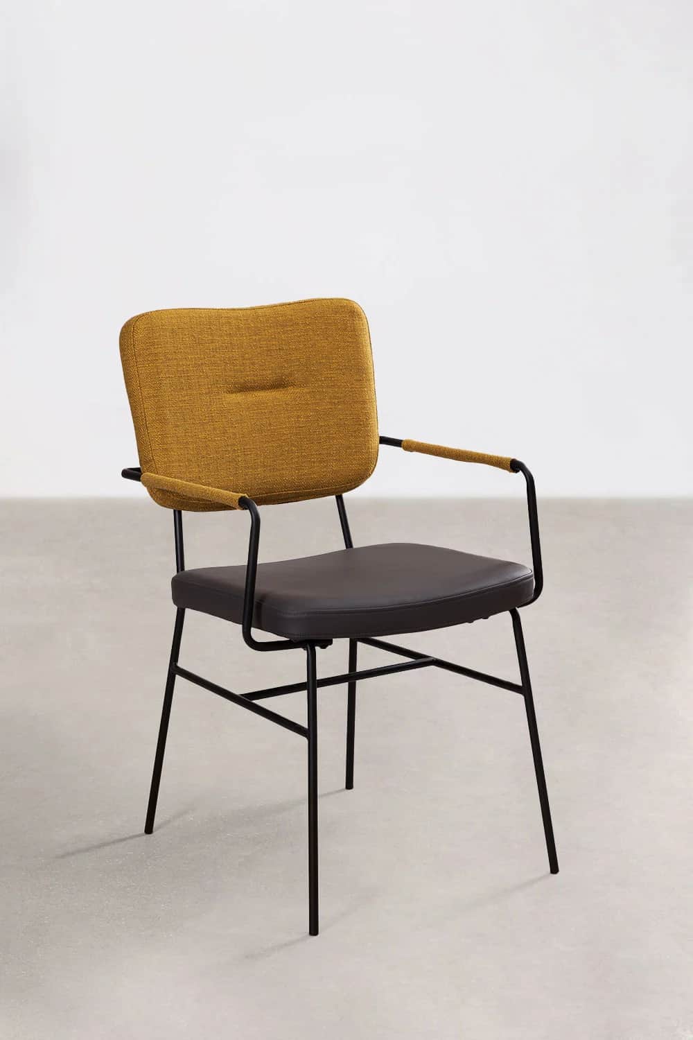 A modern armchair with a dark upholstered seat and a textured yellow fabric upholstered backrest. It… — free OBJ 3D model