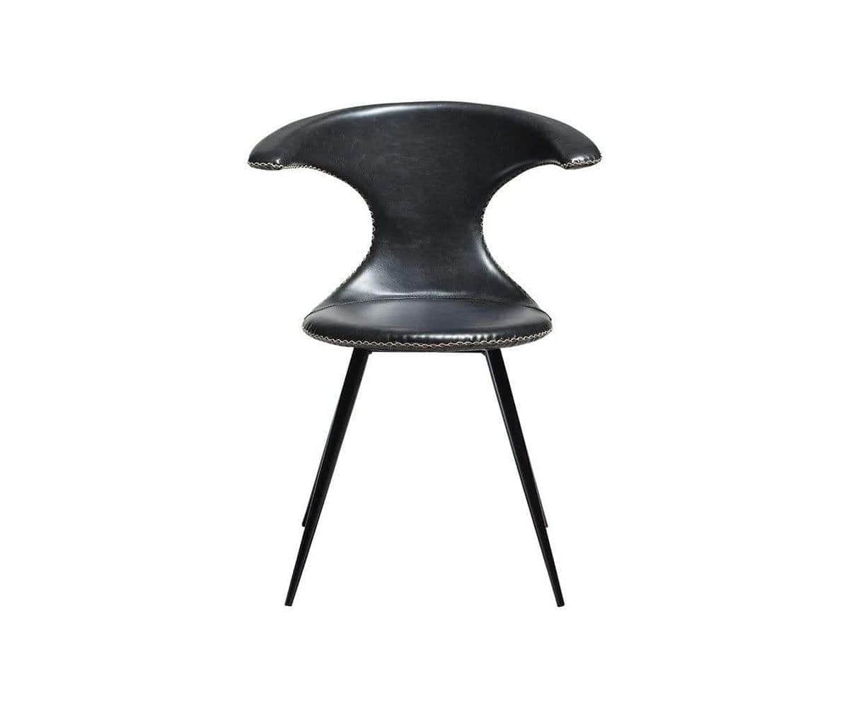 A modern black chair featuring a uniquely sculptural seat and backrest upholstered in what appears t… — 3D model