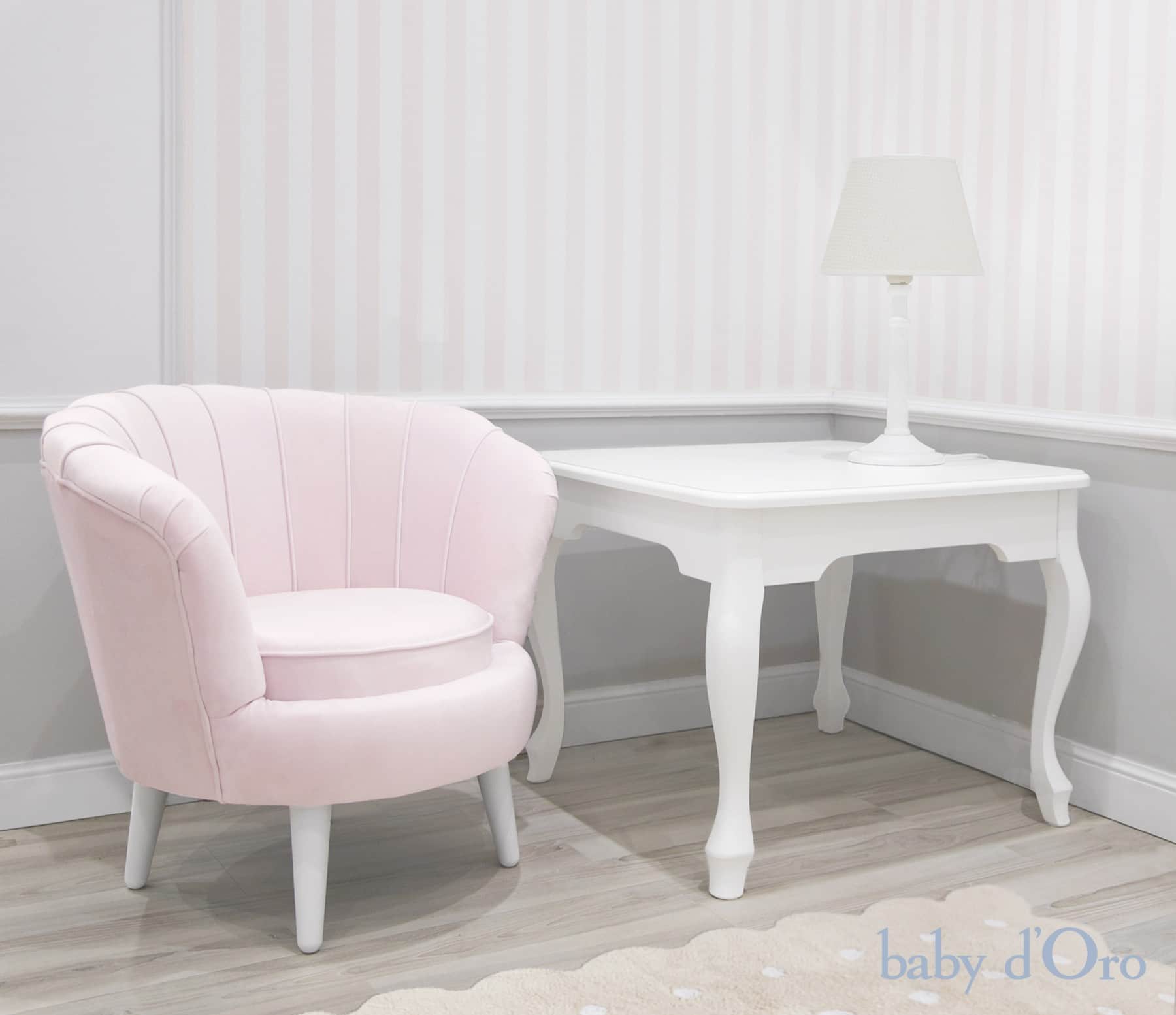 A light pink armchair with a scalloped backrest and a round seat cushion. The chair has four white,… — 3D model