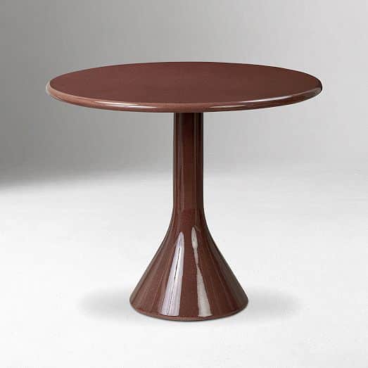 A round pedestal side table featuring a reddish-brown, speckled, high-gloss finish. The table has a… — 3D model
