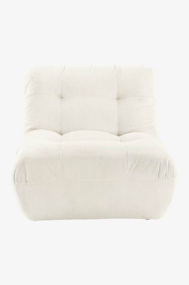 A low-profile armchair upholstered in cream-colored corduroy fabric. The armchair features a tufted… — free OBJ 3D model