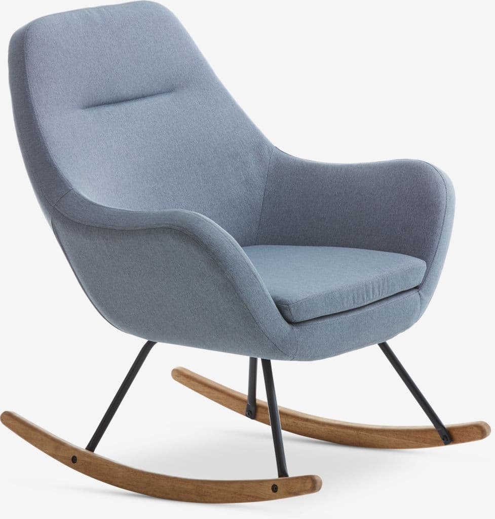A contemporary rocking chair with a curved, upholstered back and seat, featuring integrated armrests. The chair is supported by slender black metal legs that attach to curved wooden runners, allowing for a rocking motion. The upholstery appears to be a textured fabric. — 3D model