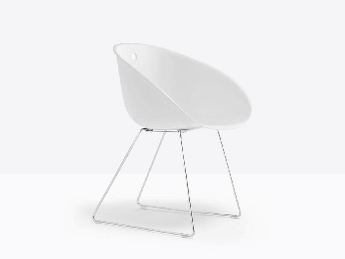 A white molded shell lounge chair with a minimalist chrome-plated wire sled base. — 3D model
