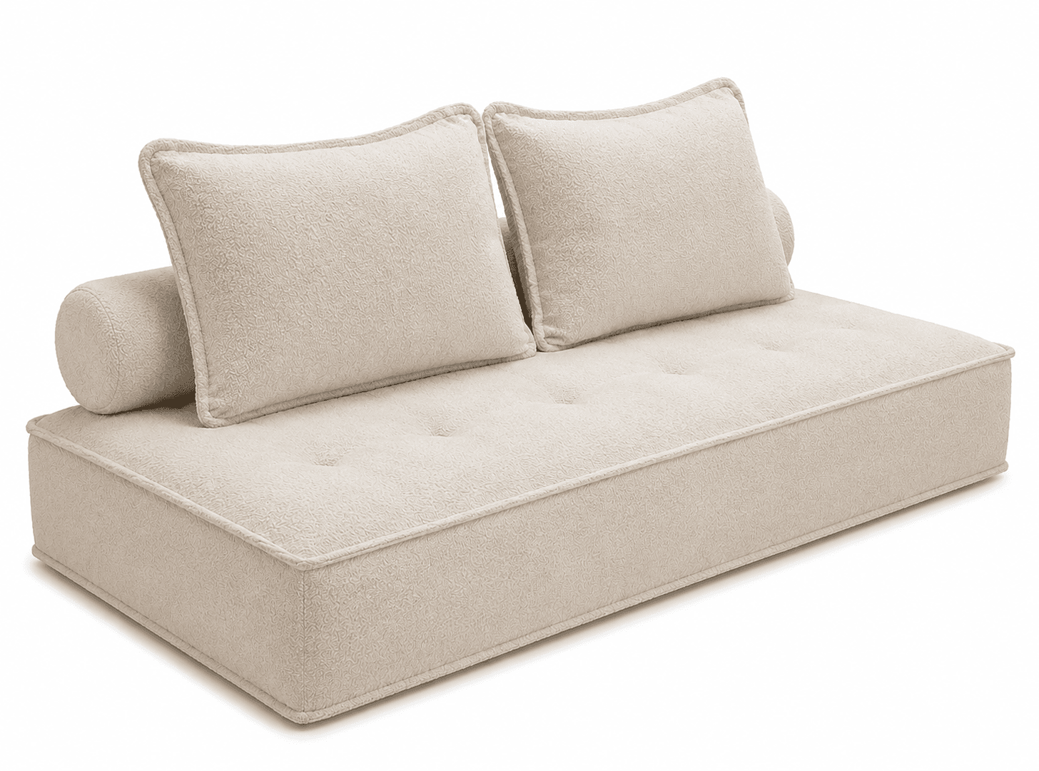A low-profile, upholstered sofa or daybed featuring a textured fabric in a neutral tone. It has a tufted seat cushion with prominent piping along the edges. Two square back cushions and one cylindrical bolster pillow are included. The overall design appears modern and minimalist. — 3D model