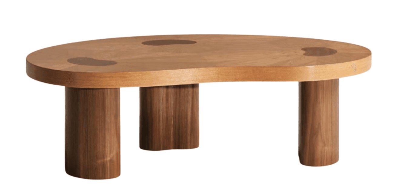 A coffee table with an organically shaped, irregular top and four cylindrical legs. The tabletop is made of lighter wood with darker, bean-shaped inlays. The legs are made of darker wood and have a rounded, slightly flattened base. — 3D model