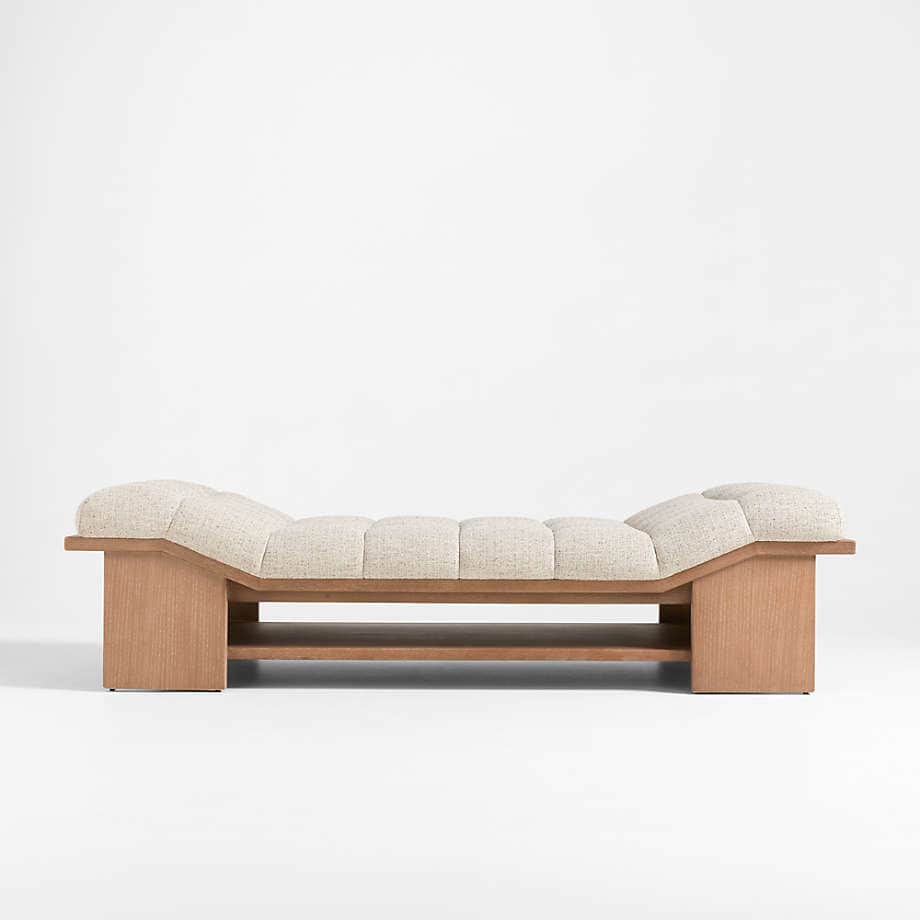 A modern upholstered bench with a sculpted wooden frame. The bench features a cushioned seat with ch… — 3D model
