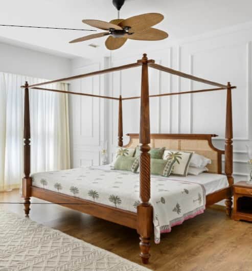 A classic four-poster bed with a wooden frame. The headboard features a cane weave panel. The bed is… — free OBJ 3D model