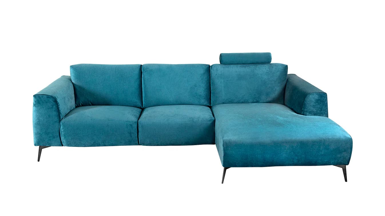 A sectional sofa with a chaise lounge extension. The sofa features deep seating with plush cushions and a movable headrest on the corner section. It is upholstered in a textured fabric and supported by slim, dark-colored legs. — 3D model